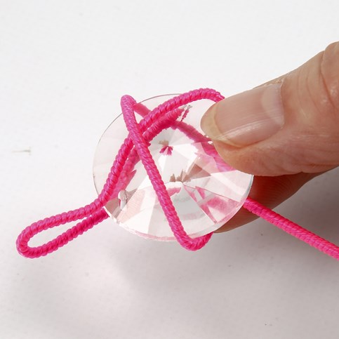 A Necklace with a Prism in a Net made from a Nylon covered Aluminium Bar