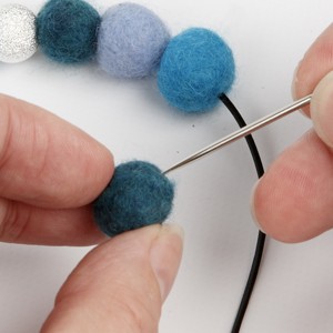 Trendy wool ball jewellery