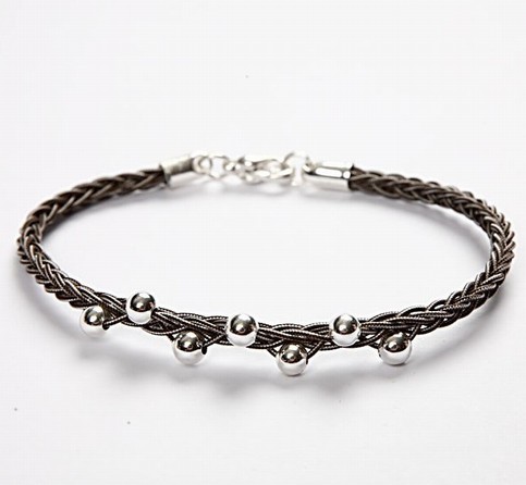 Woven whip bracelet with silver beads