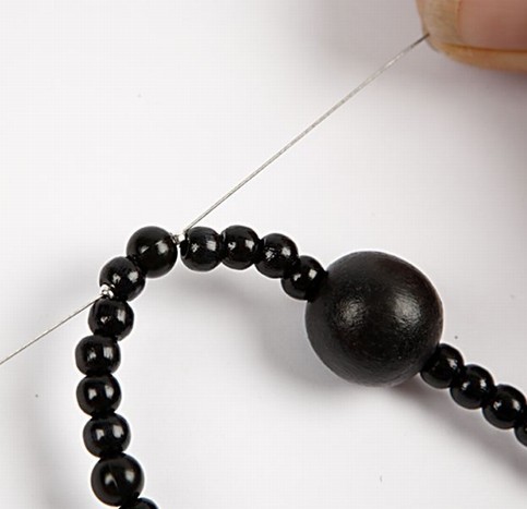 Necklace with black wooden beads