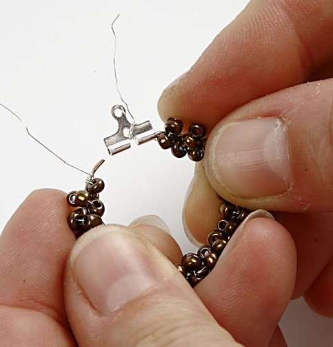 Round earrings with rocaille seed beads.