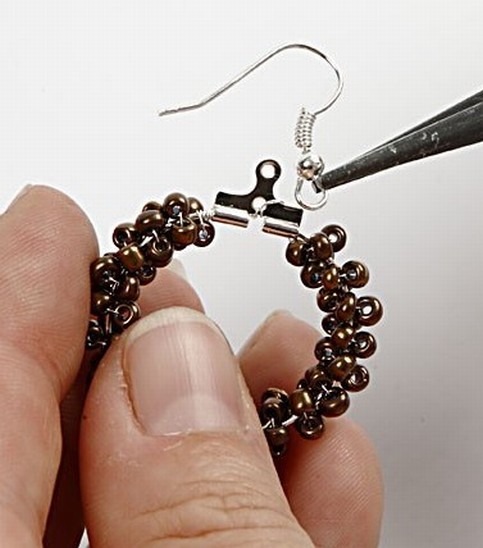 Round earrings with rocaille seed beads.