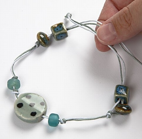 A Necklace and Bracelet with Turquoise Ceramic Beads