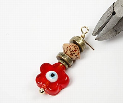 Earrings with a flower glass bead